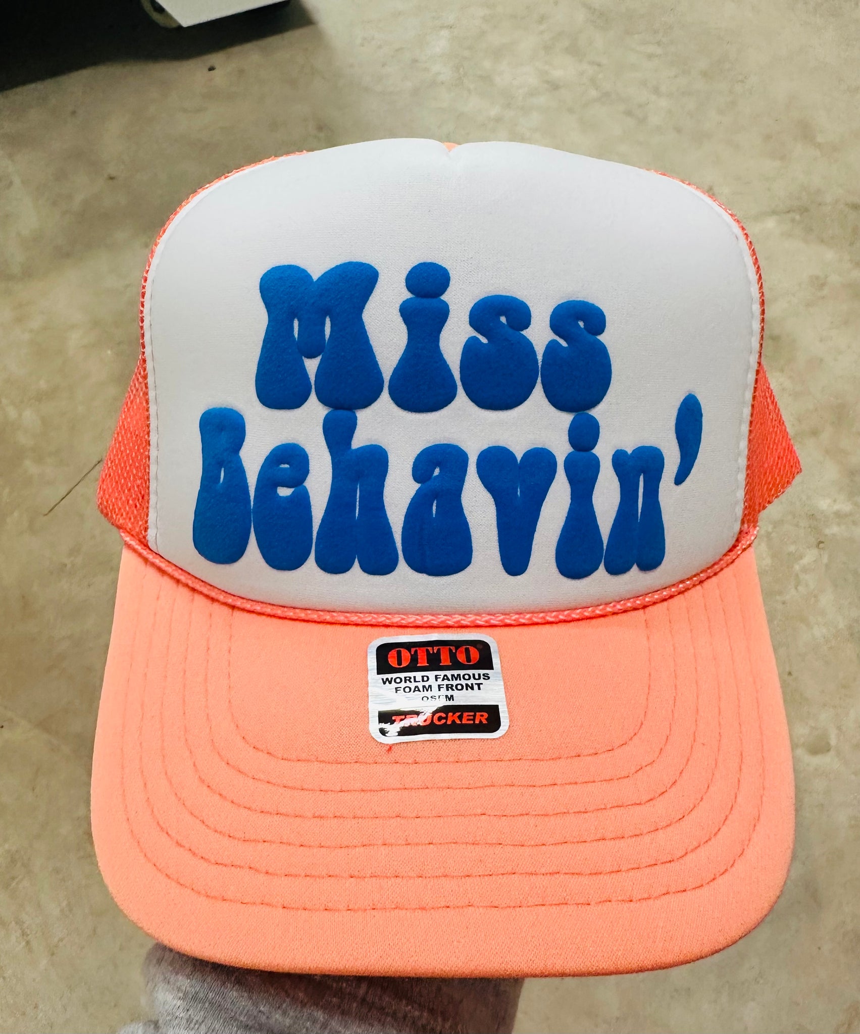 Miss Behavin' Puff Blue Vinyl on Coral and White Trucker Hat