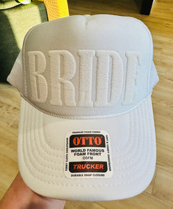 Bride with white puff vinyl on a White Trucker Hat