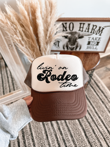 Livin on Rodeo Time DTF Printed Brown & Tan Trucker Hat