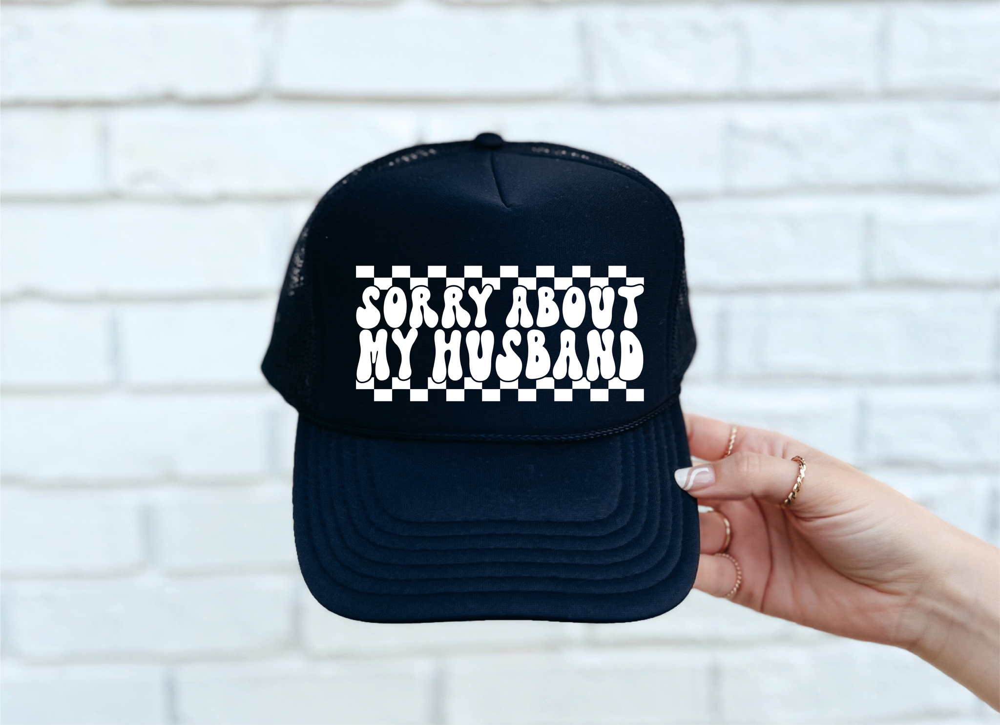 Sorry About My Husband DTF Printed Black Trucker Hat/White Text CHECKERED DESIGN